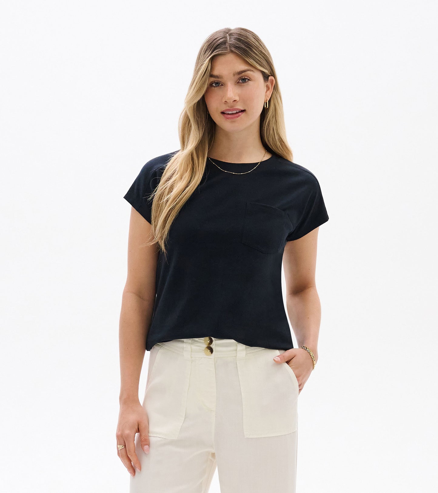 Black relaxed short-sleeve tee with a chest pocket, shown on a model front view.