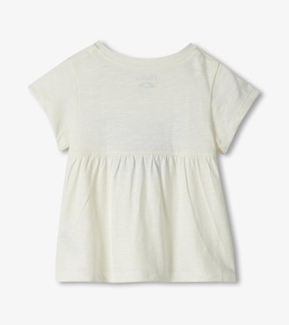 Cream short-sleeve baby dress with gathered waist, back view