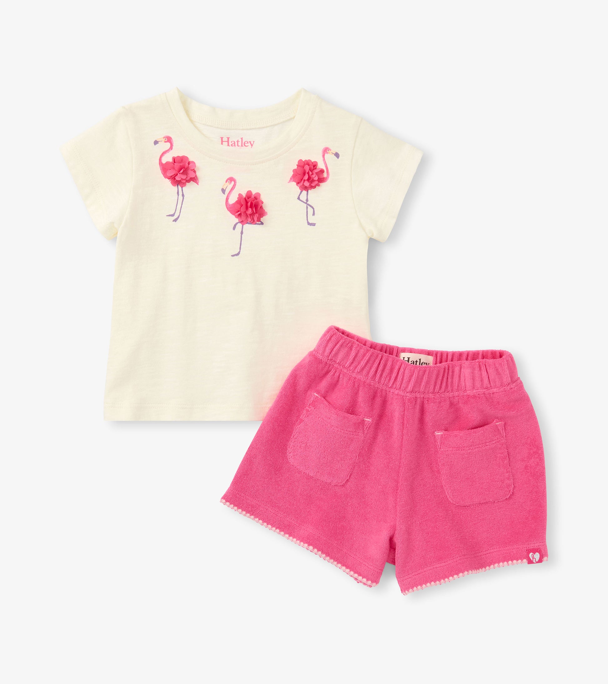 Cream short-sleeve T-shirt with pink flamingo print and bright pink shorts set, front view