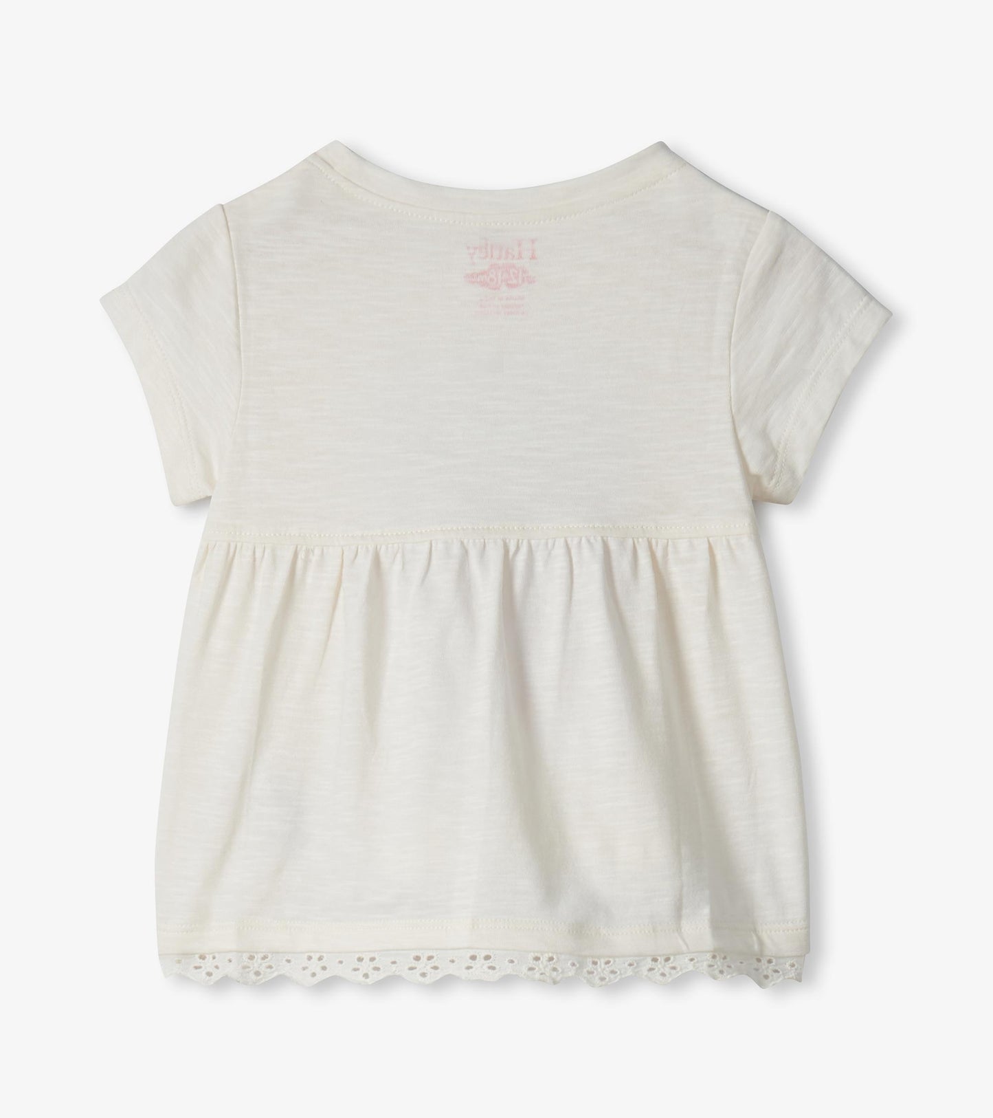 Cream short-sleeve toddler T-shirt with gathered hem and lace trim, back view