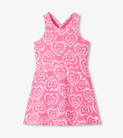 Pink sleeveless A-line dress with heart tie-dye print and scoop back neckline, front view