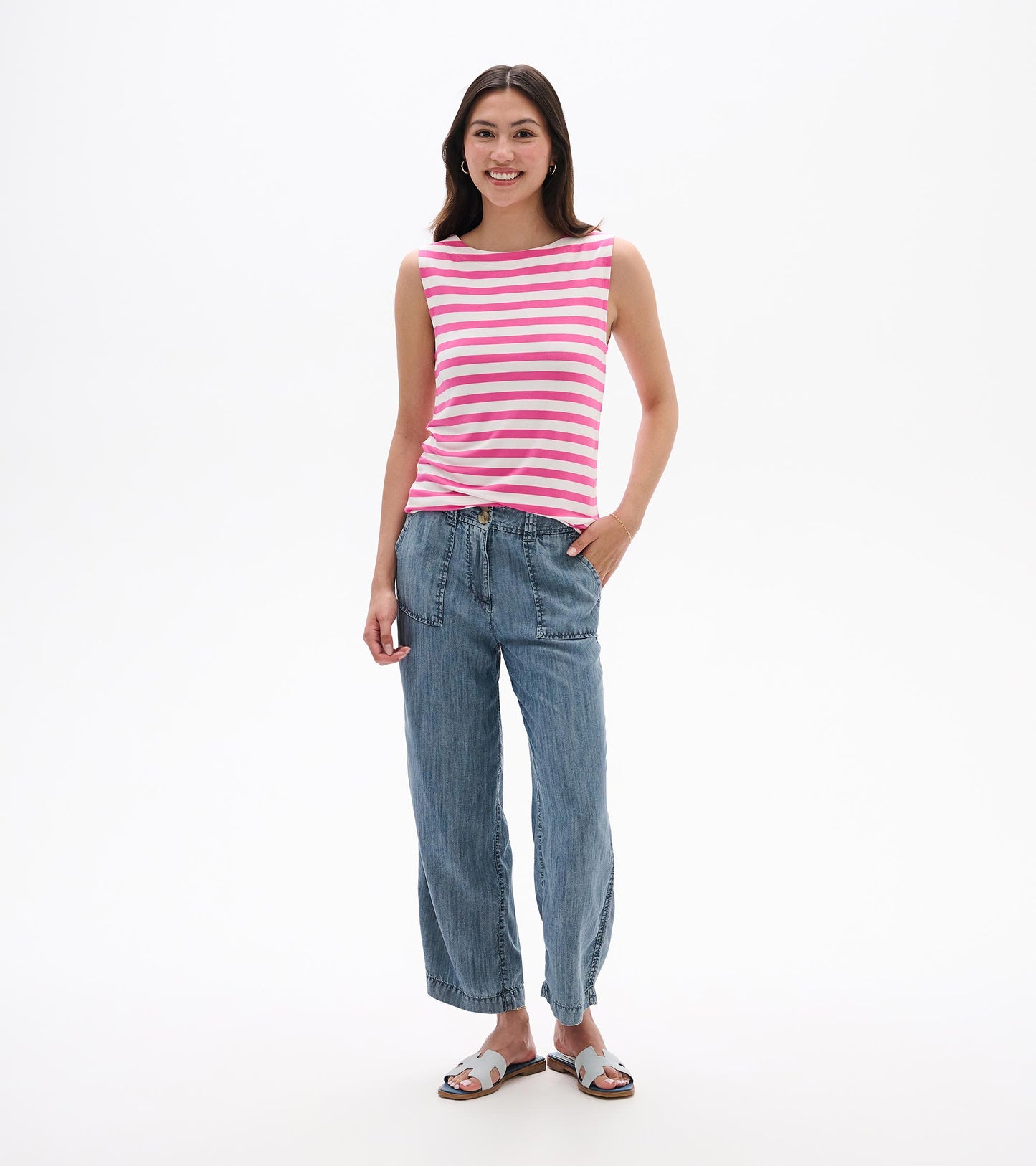 Sleeveless pink and white striped tank top, front view, worn with a boat neckline.