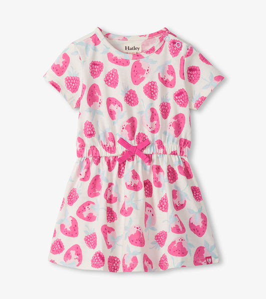 White short-sleeve toddler dress with pink berry print, gathered waist, and bow detail, front view