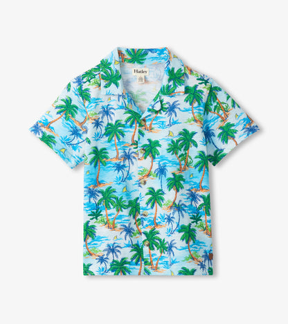 Short-sleeve button-down shirt with light blue tropical palm tree print, front view