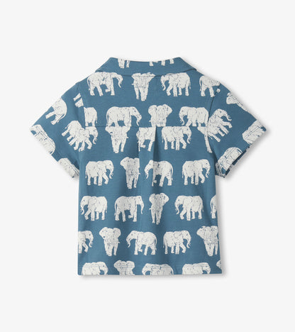 Blue short-sleeve button-down shirt with white elephant print, back view