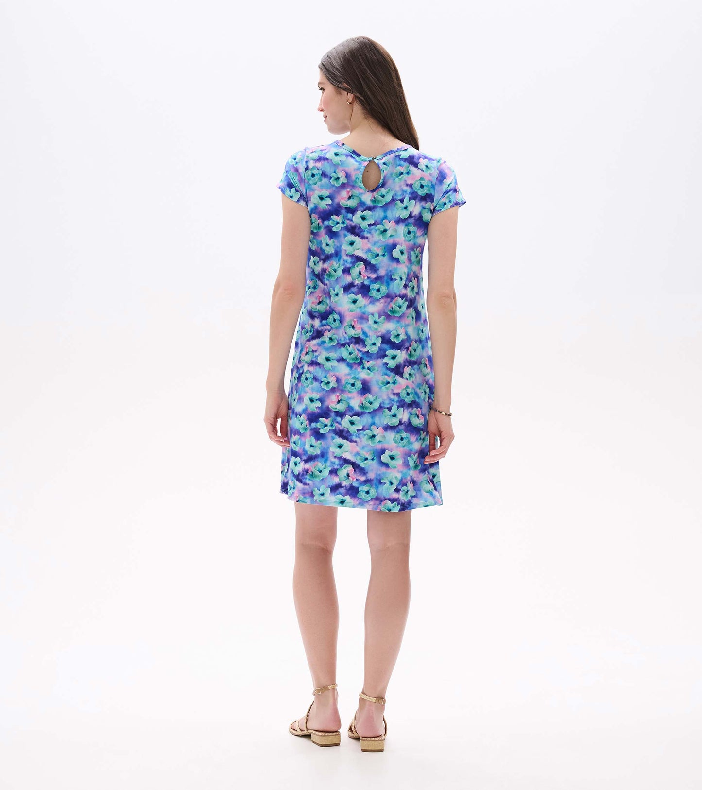 Back view of Cici A-line dress with short sleeves and keyhole neckline in blue floral print