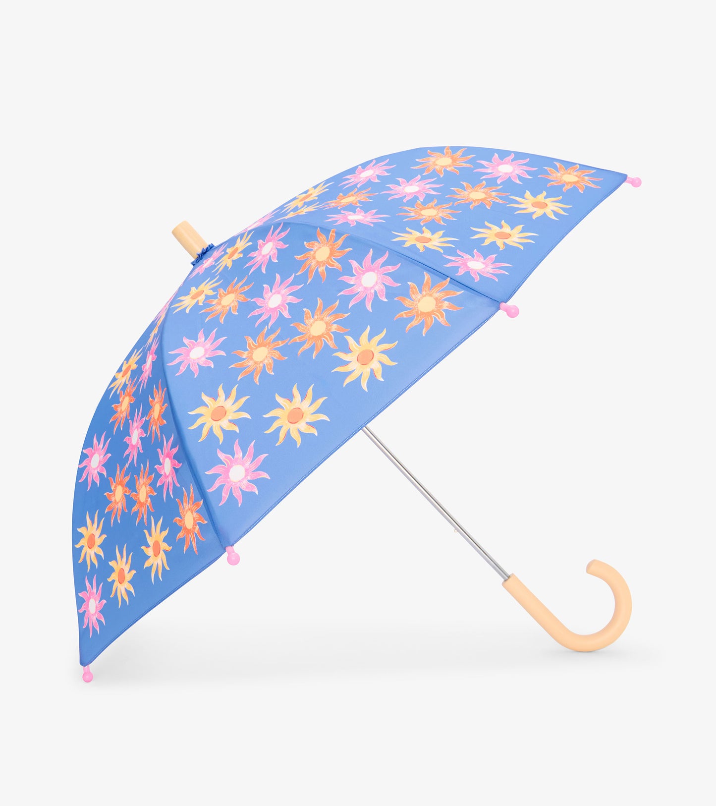 Open kids umbrella with blue canopy, pink orange and yellow sun print, pink tips, and curved wooden handle