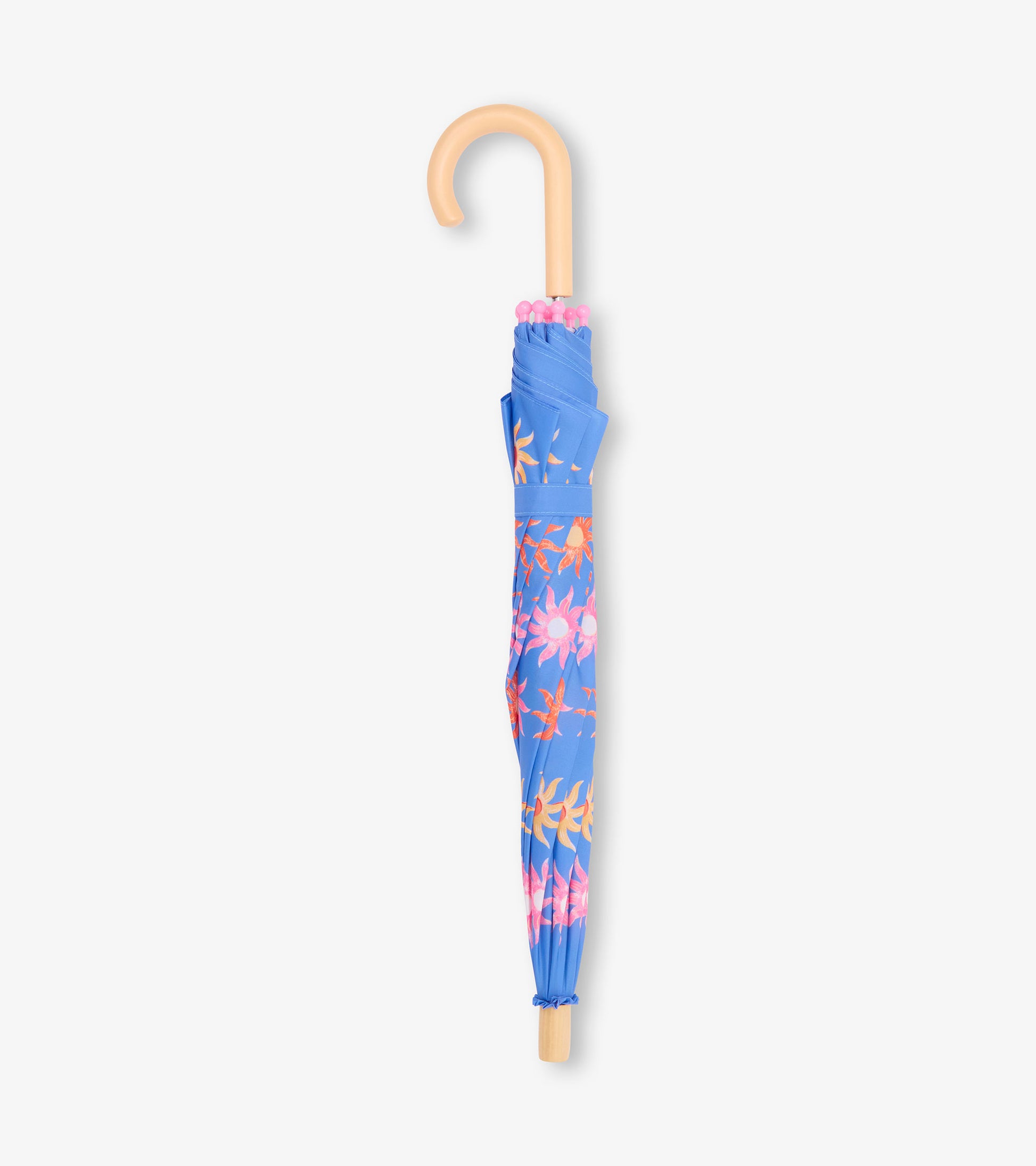 Folded blue umbrella with pink and orange floral print and tan curved handle