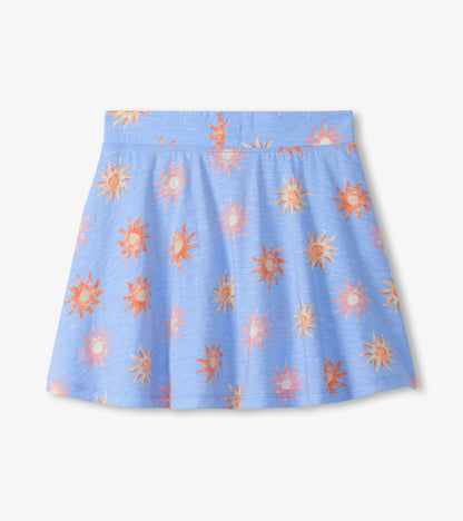 Blue girls skort with orange and pink sun print, flared hem, front view