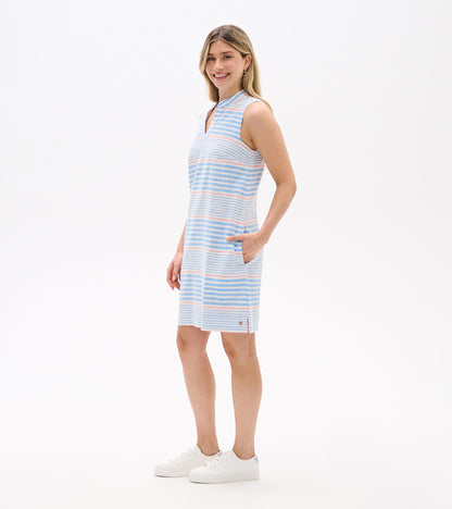 Side view of sleeveless blue and white striped dress with pink accents and side pocket