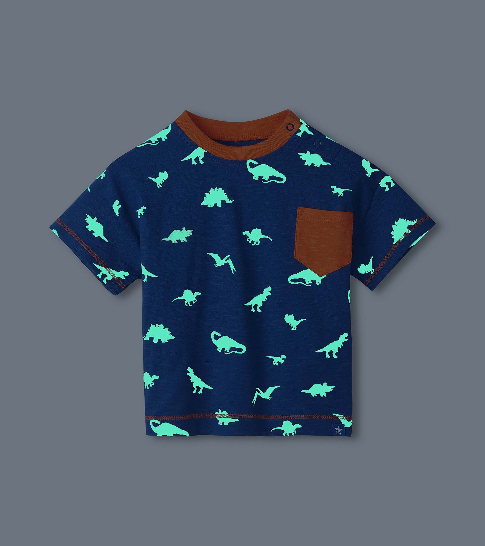 Navy short-sleeve toddler T-shirt with glowing dinosaur print, brown ribbed collar, chest pocket, and crew neck