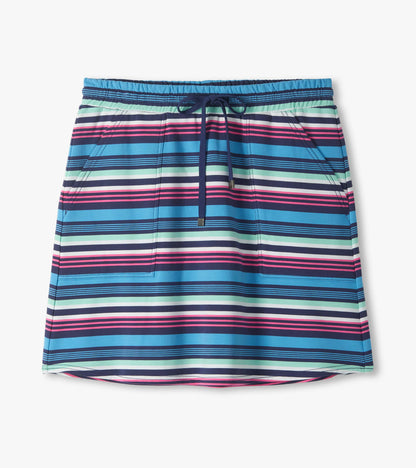 Front view of a striped skirt with elastic waistband, drawstring, and side pockets in blue, navy, mint, pink, and white.