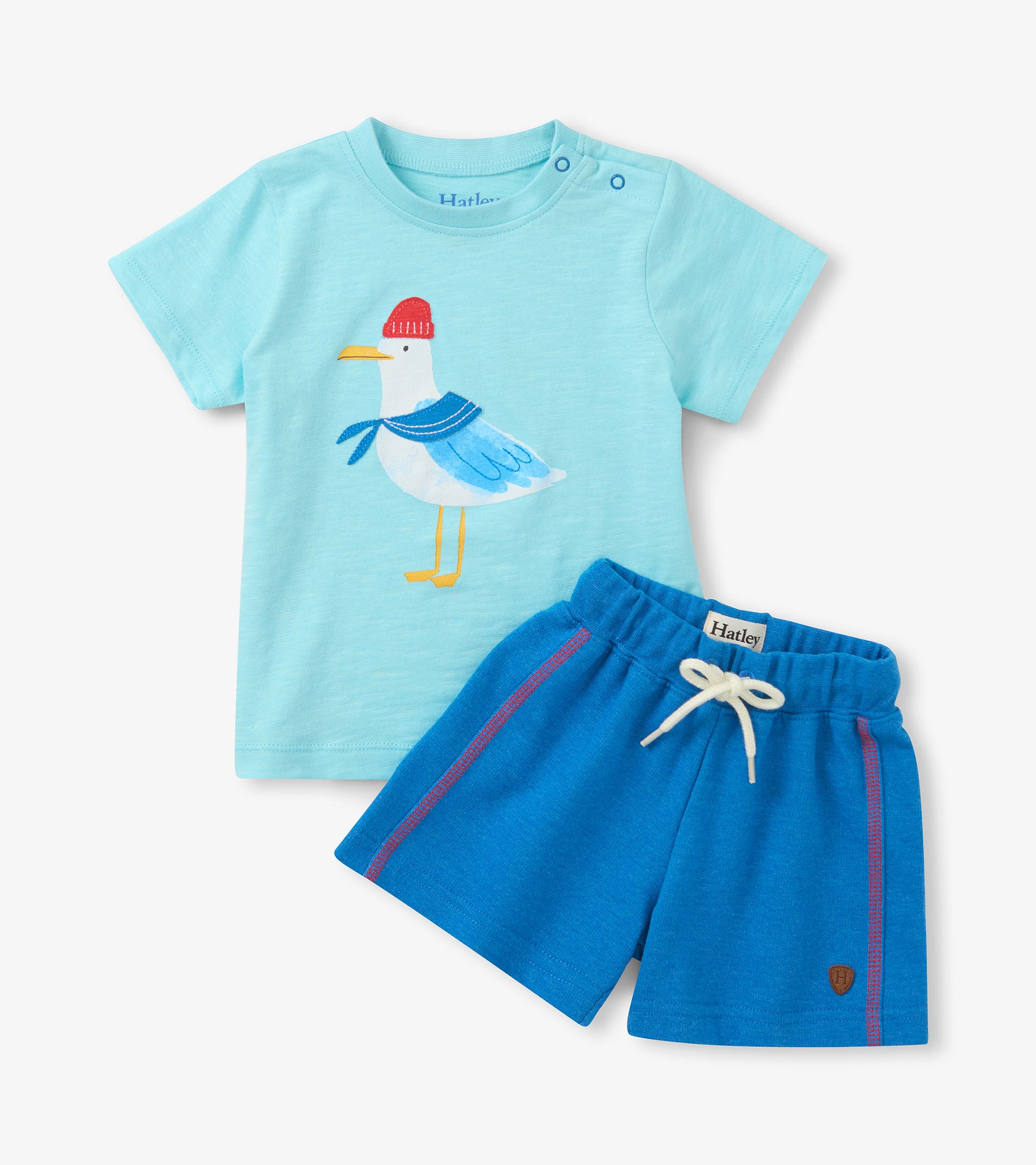Light blue toddler T-shirt with seagull graphic and blue shorts set, front view