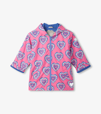 Pink girls zip-up rain jacket with blue heart print, hood, and three-quarter sleeves, front view