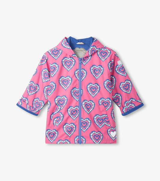 Pink girls zip-up rain jacket with blue heart print, hood, and three-quarter sleeves, front view