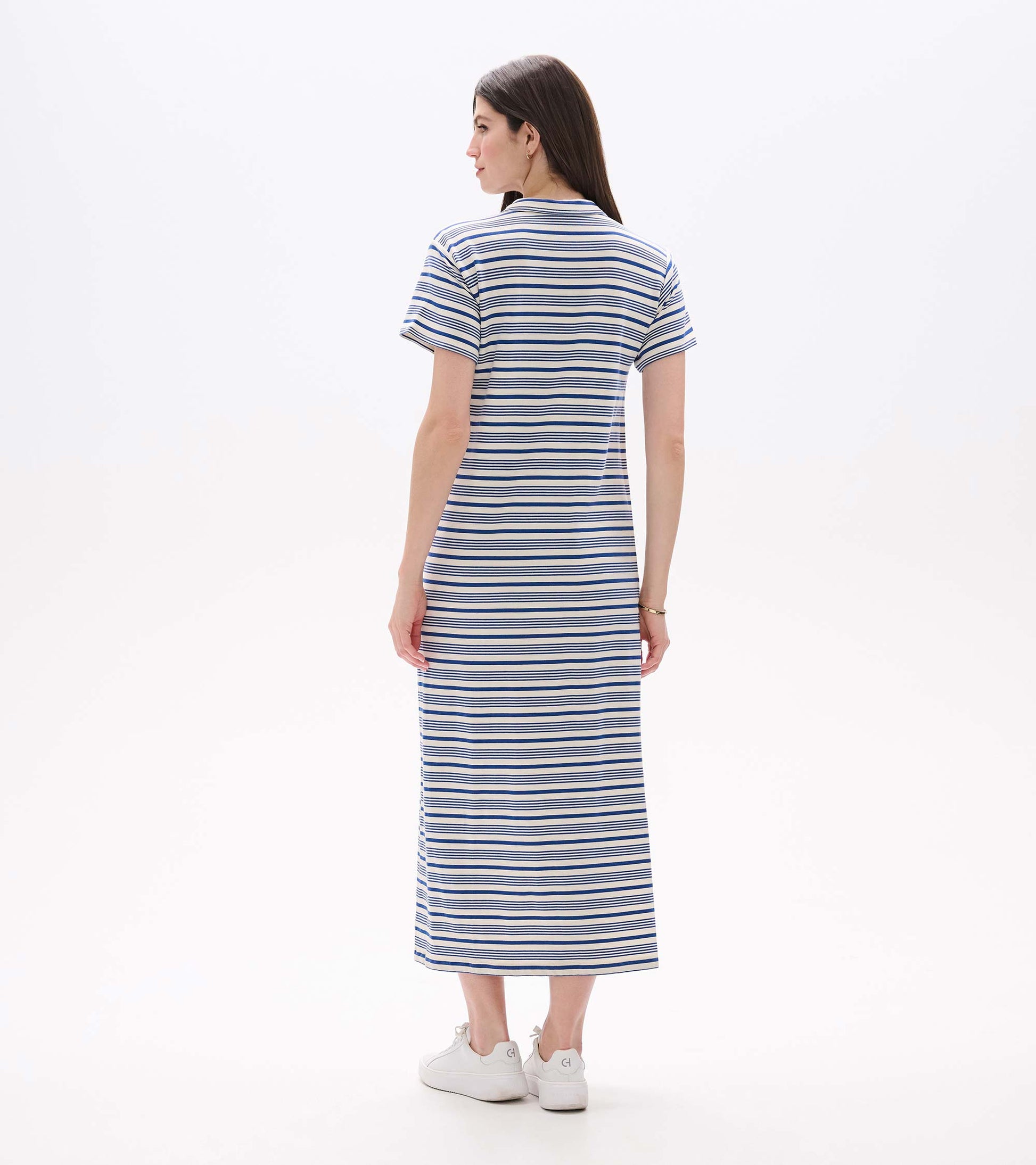 Back view of a blue-and-white striped short-sleeve maxi dress with a straight fit and crew neck.