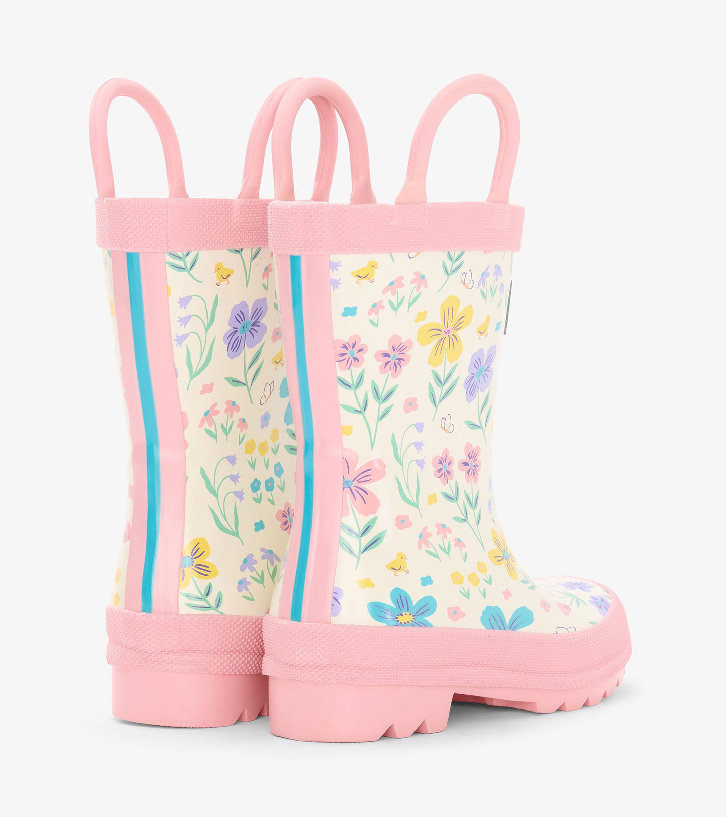 Pink toddler rain boots with floral and chick print, shown in side view with handles and treaded soles