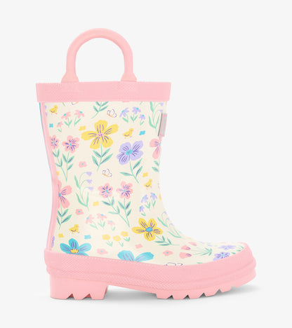 Pink toddler rain boot with floral and chick print, side view, white shaft and pink sole
