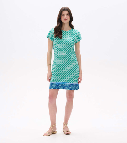 Short-sleeve teal patterned tee dress with blue border, shown on model front view