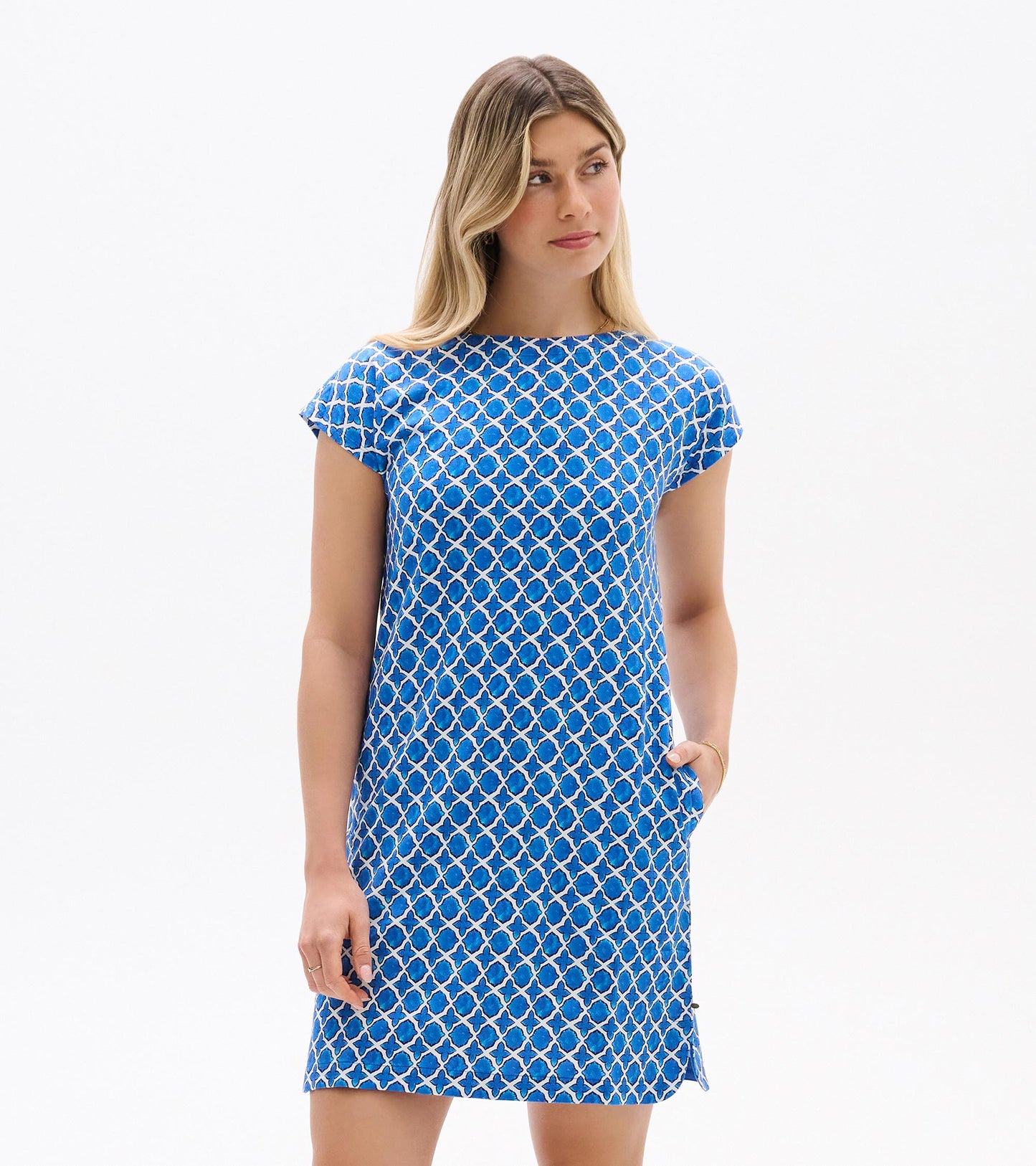 Blue and white medallion print short-sleeve shift dress, front view, with boat neckline and side pockets