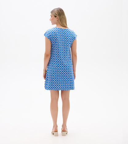 Back view of a blue and white geometric print short-sleeve dress with a straight, above-knee silhouette