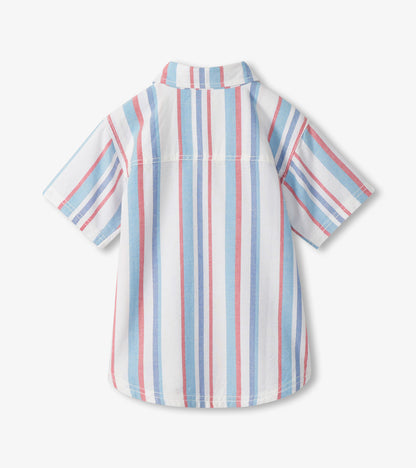 Back view of a white woven button-down shirt with vertical blue and pink stripes and short sleeves