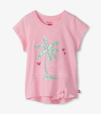 Pink girls tie-front T-shirt with short sleeves and a sequin palm tree graphic on the front