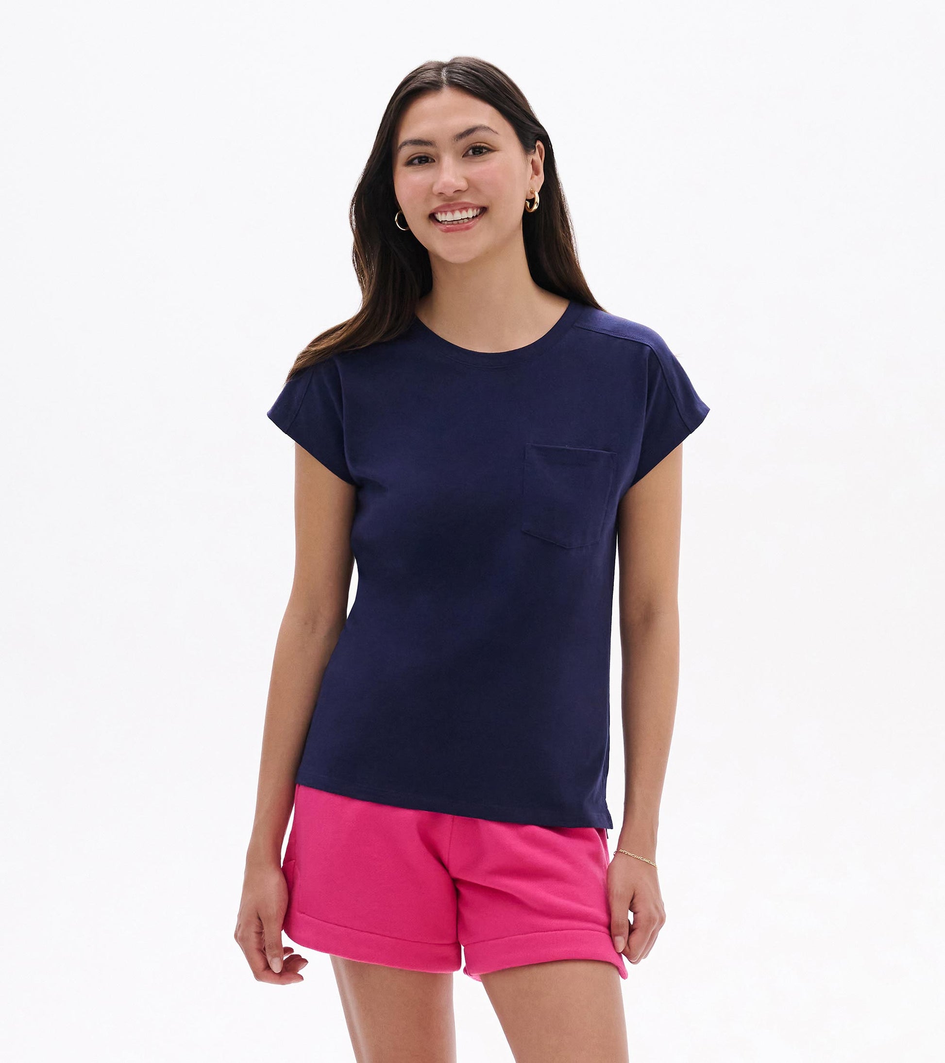 Navy relaxed-fit short-sleeve tee with crew neck and chest pocket, worn by model