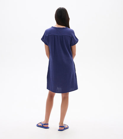 Back view of a navy blue short-sleeve knee-length dress with a relaxed fit and textured fabric