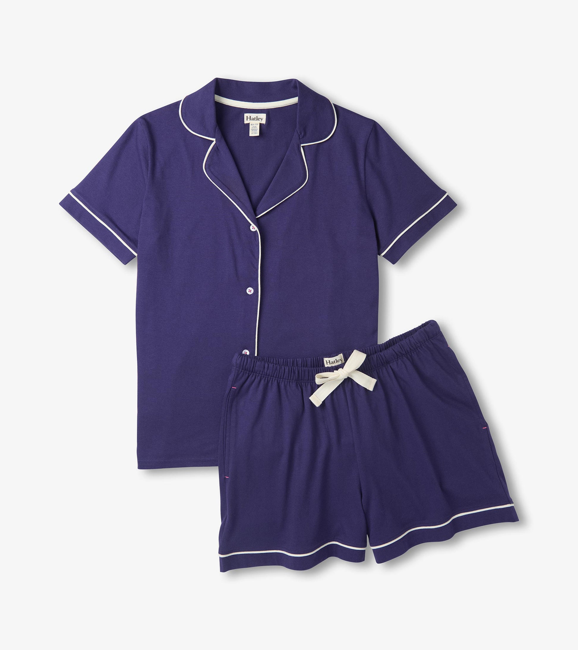Navy short pajama set with white piping, button-front top, and drawstring shorts