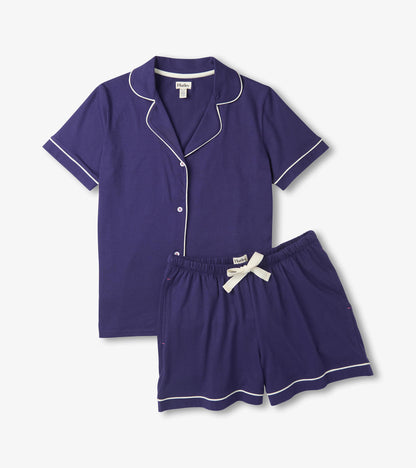 Navy short pajama set with white piping, button-front top, and drawstring shorts