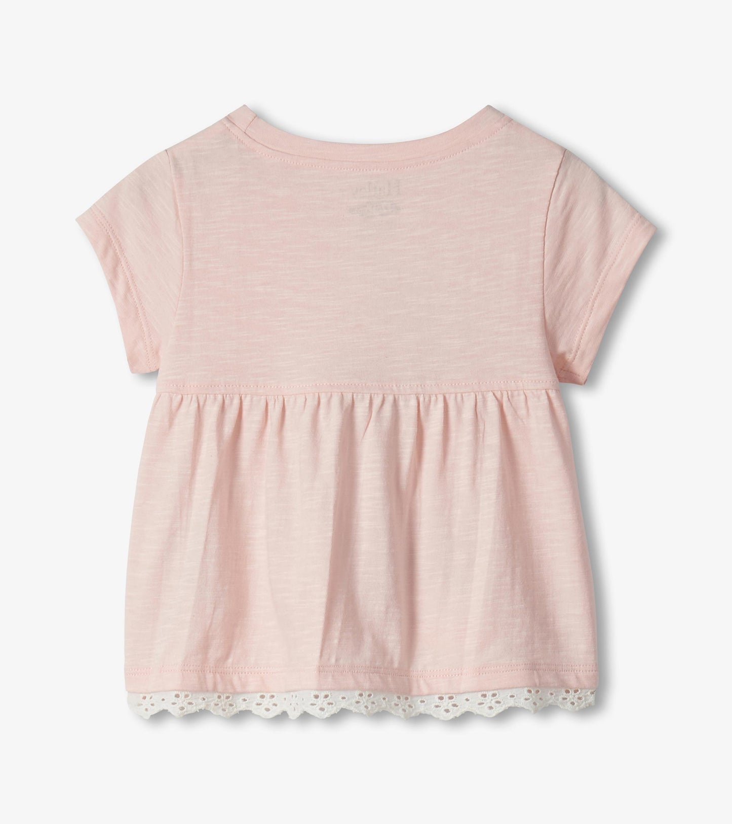 Light pink short-sleeve toddler top with gathered hem and lace trim, back view