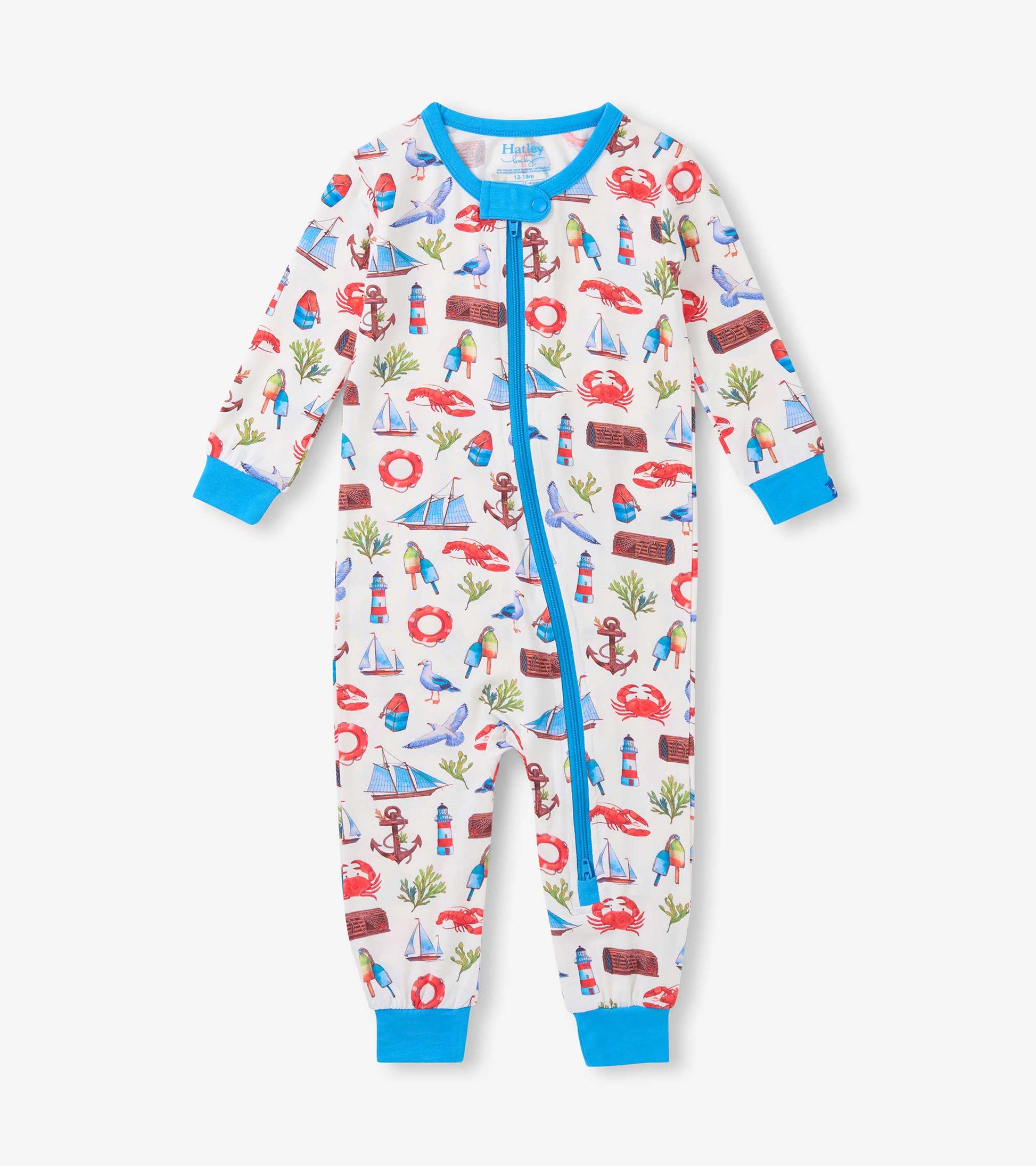 White baby sleeper with blue trim and colorful seascape print, long sleeves, front zipper, and footed legs