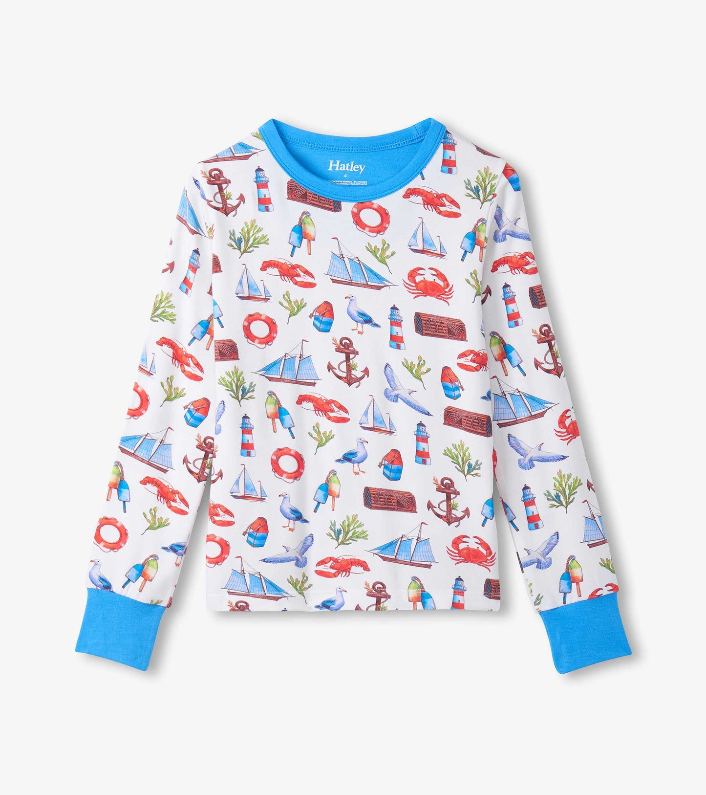 Long-sleeve white pajama top with blue trim and colorful seascape print of boats, lighthouses, anchors, and crabs