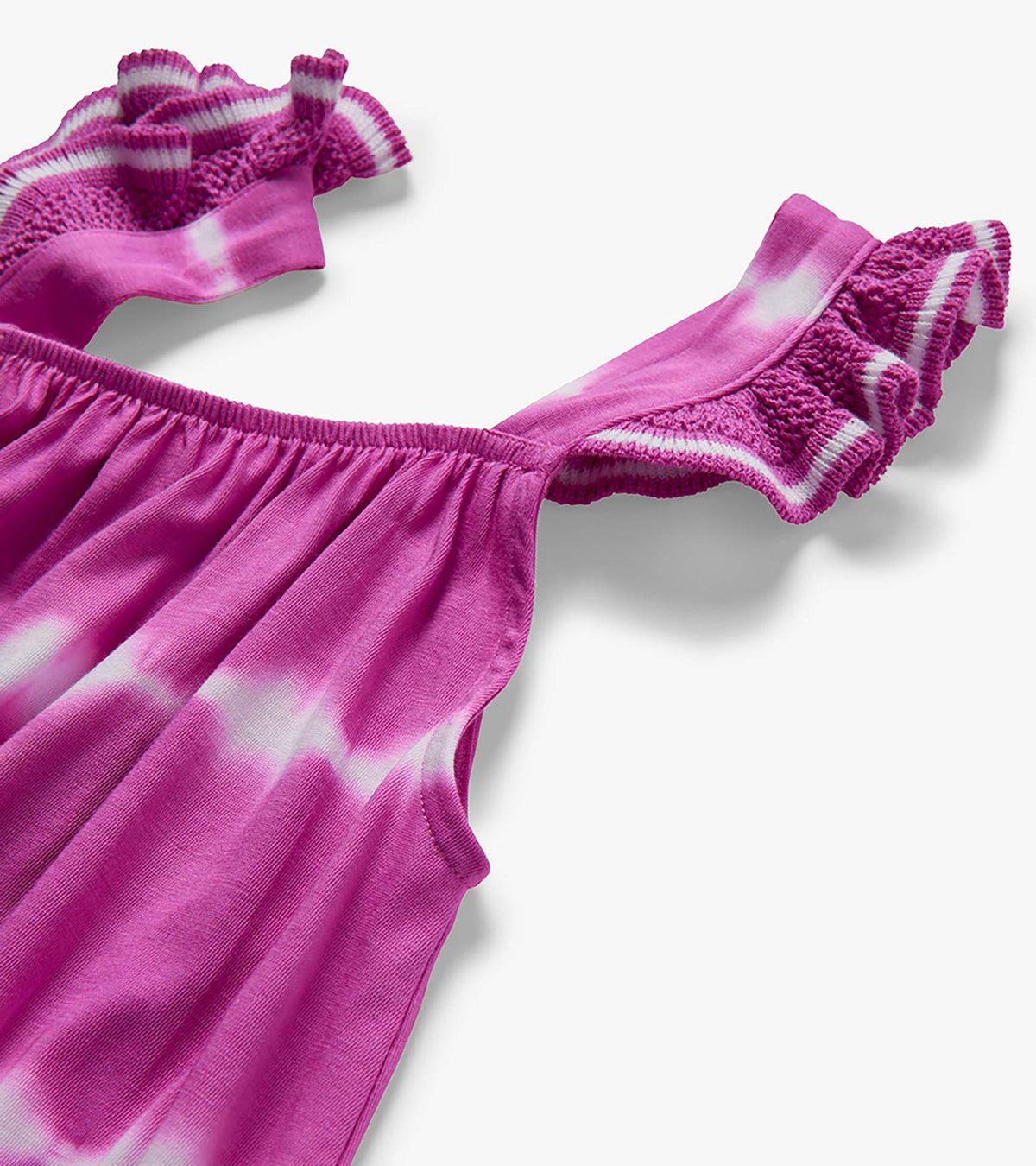 Close-up of purple tie-dye dress neckline and crochet flutter sleeves with white striped trim