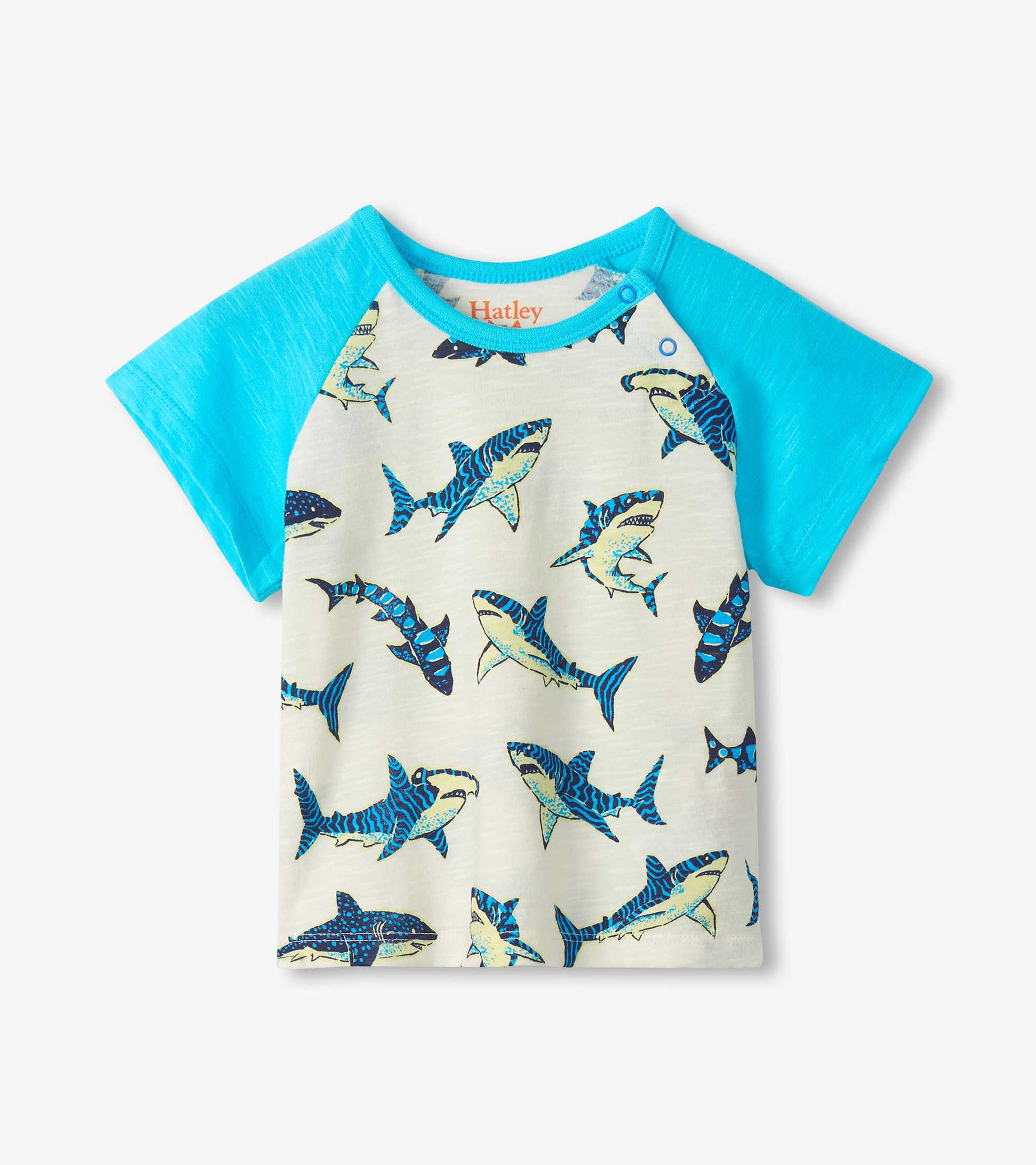 Short-sleeve raglan T-shirt with turquoise sleeves and cream shark print body, front view