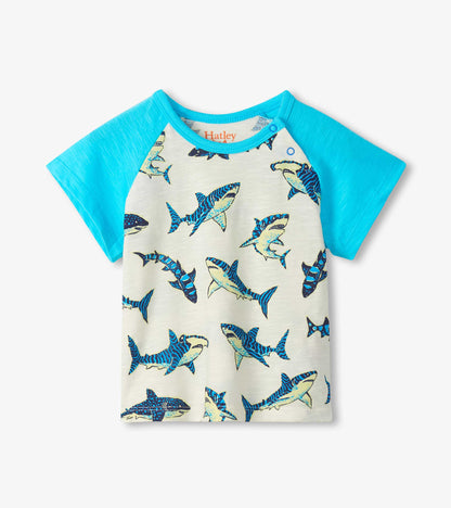 Short-sleeve raglan T-shirt with turquoise sleeves and cream shark print body, front view