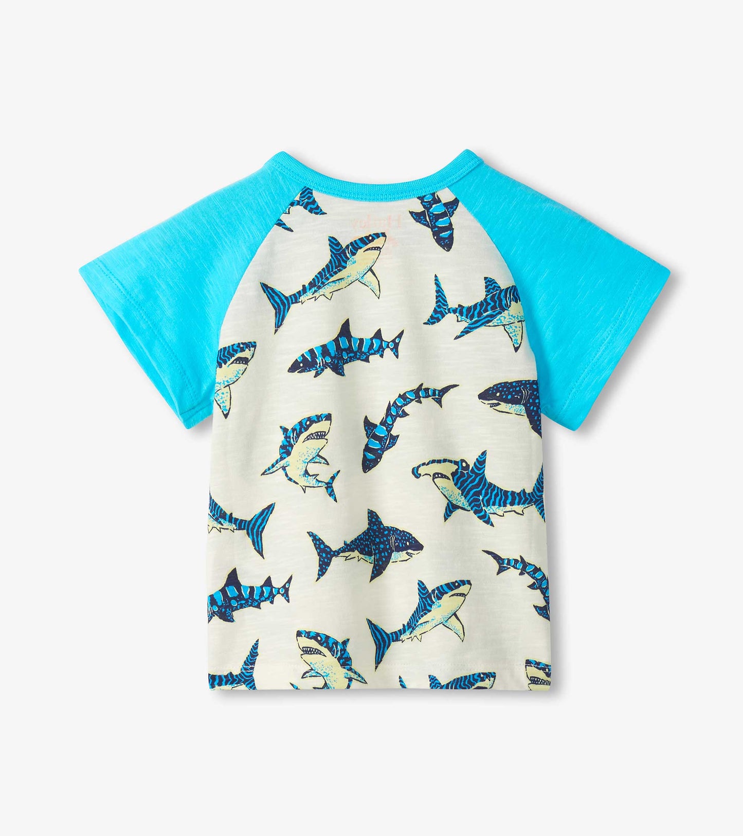 Short-sleeve raglan T-shirt with bright blue sleeves and cream body covered in blue shark print, front view