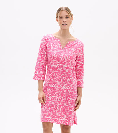Front view of pink Lily notch neck dress with white geometric line pattern and three-quarter sleeves
