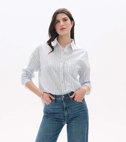 Front view of relaxed button-down shirt in pale blue and white stripes with chest pocket and collar