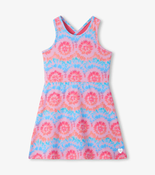 Girls tie-dye A-line dress with crisscross back straps in pink, blue, and coral.
