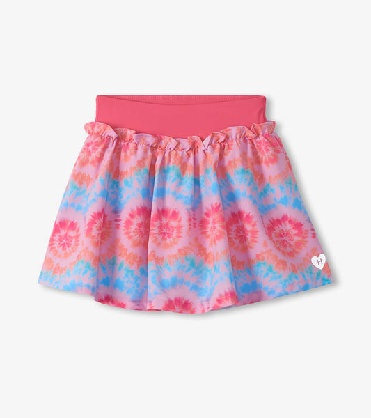Girls pink tie-dye ruffle skort with elastic waistband and flared skirt overlay, front view
