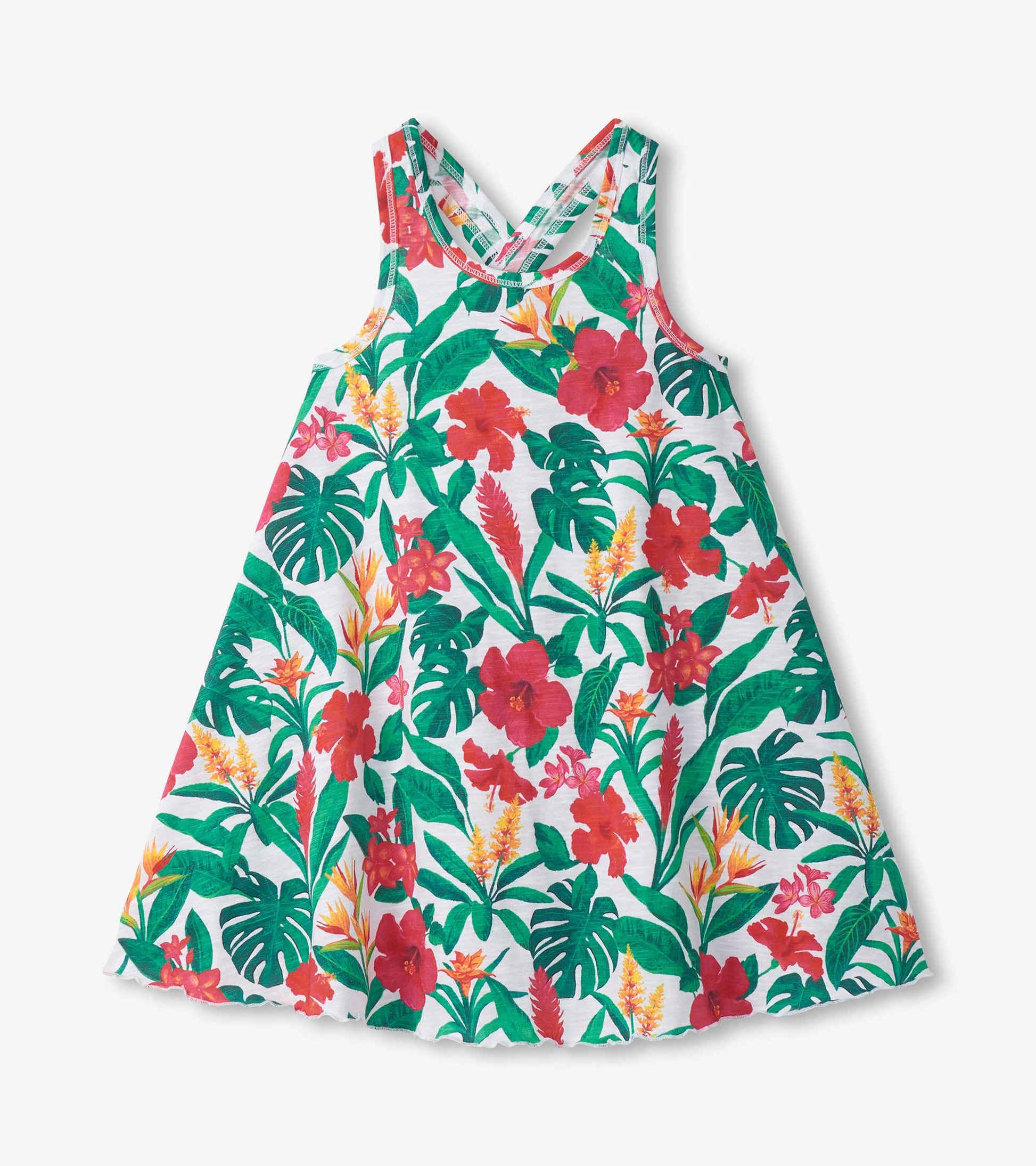 Girls white trapeze dress with green tropical leaves and red floral print, sleeveless with scoop neckline
