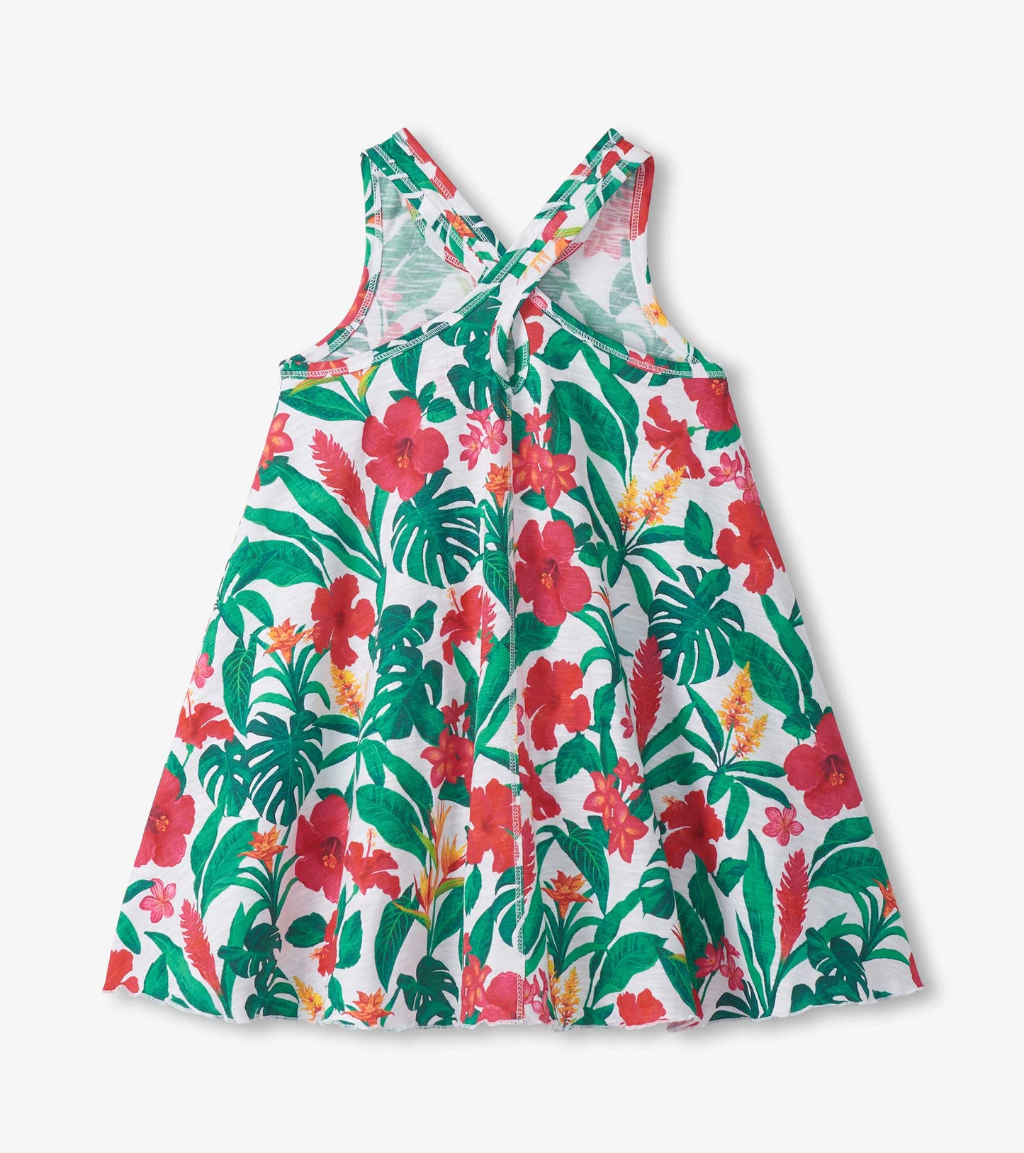 Girls tropical floral trapeze dress with white background, green leaves, and red-pink flowers, back view