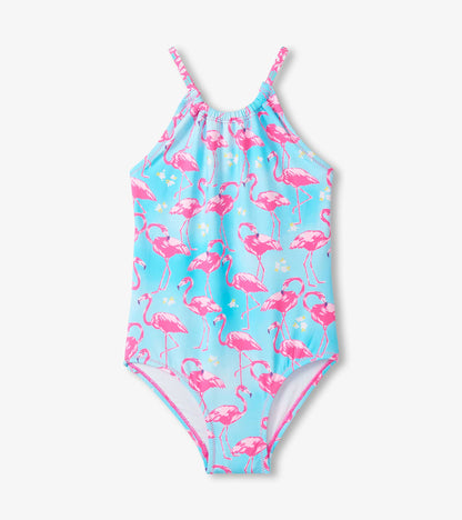 Girls blue one-piece swimsuit with pink flamingo print and spaghetti straps, front view