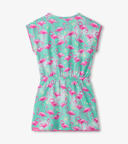Girls turquoise dress with pink flamingo print and cinched waist, front view