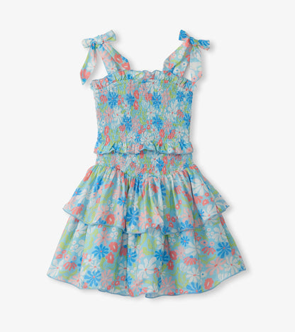 Girls blue floral smocked dress with bow shoulder straps and tiered ruffle skirt