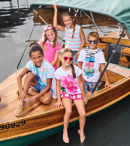Girls white T-shirt with large pink hibiscus flower print and short sleeves, front view