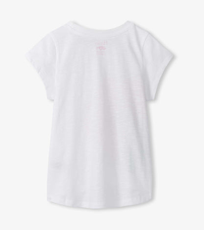 White girls short-sleeve T-shirt with crew neck and subtle pink hibiscus graphic on back, back view
