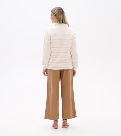 Back view of cream long-sleeve top with pink horizontal stripes and collared neckline
